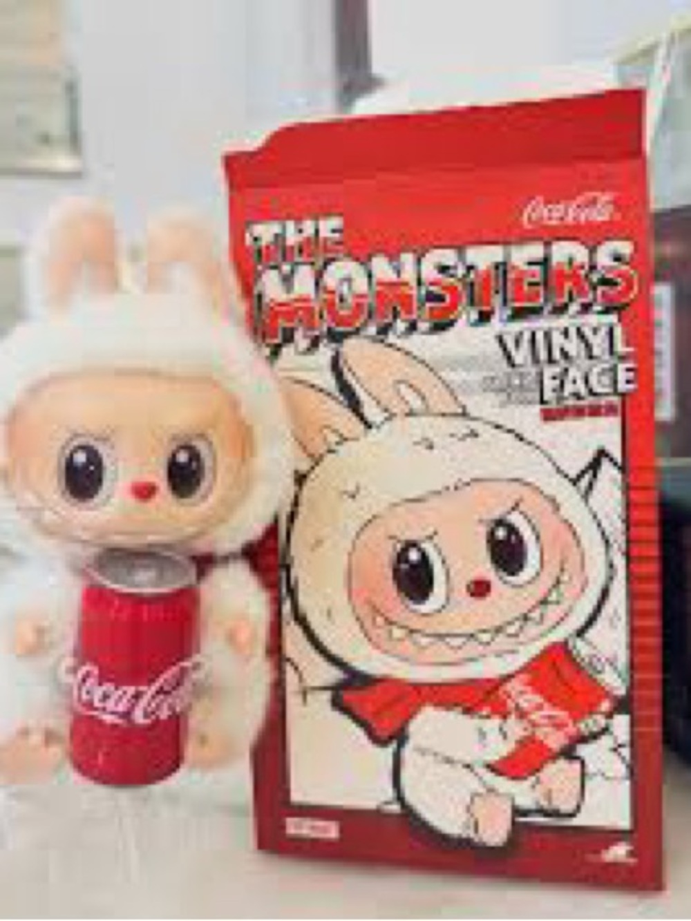 Coca-Cola Series plush toy,the "Happy Factor" Labubu With miniature Coke can.
